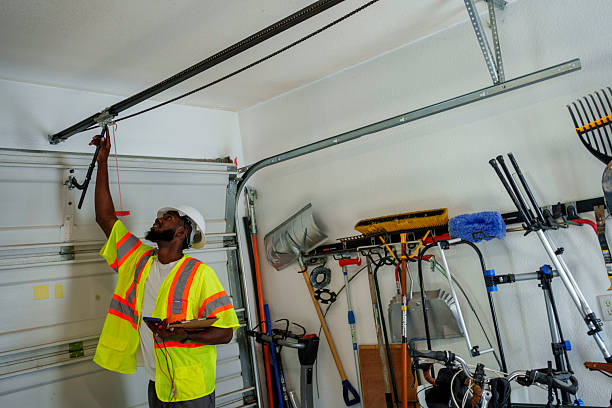 Professional Garage Door technician working in Markle, IN